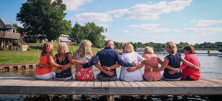 A group of seniors gathered together, offering support to one another, overcoming the challenges of Alcoholism Among Seniors in West Virginia