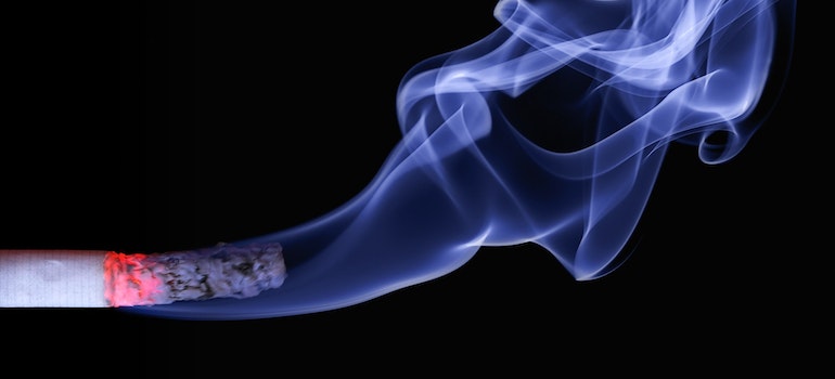 A lit cigarette as one of the most common addictions in West Virginia