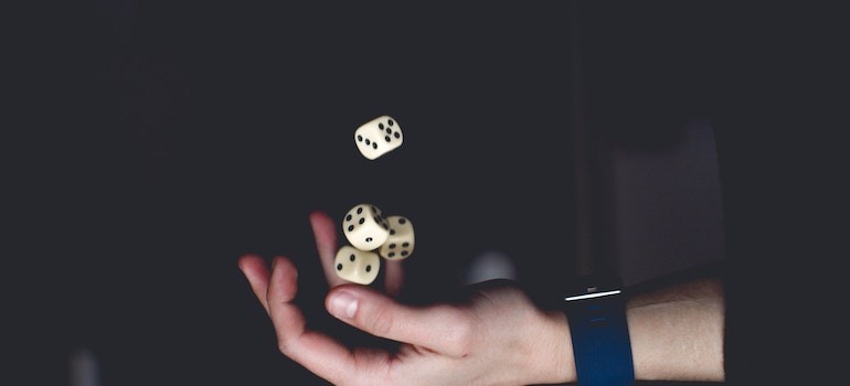 Person throwing dice