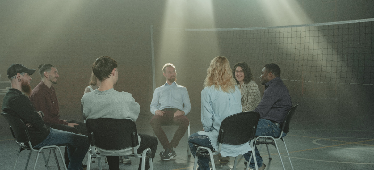 A group therapy session discussing isolation and addiction in rural West Virginia communities.