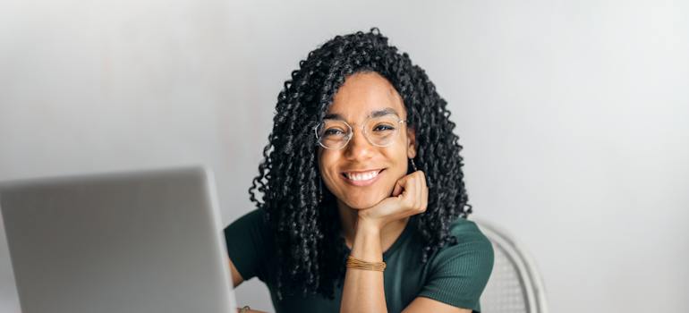 A happy person after reading about the importance of debunking myths about marijuana's harmless reputation in West Virginia