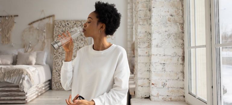 A woman drinking water