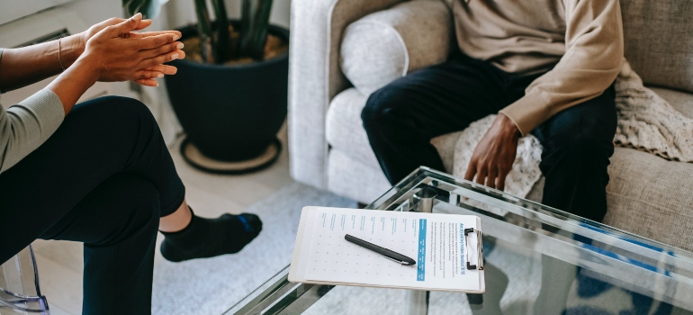 A therapist talking to a patient about what is cross-addiction