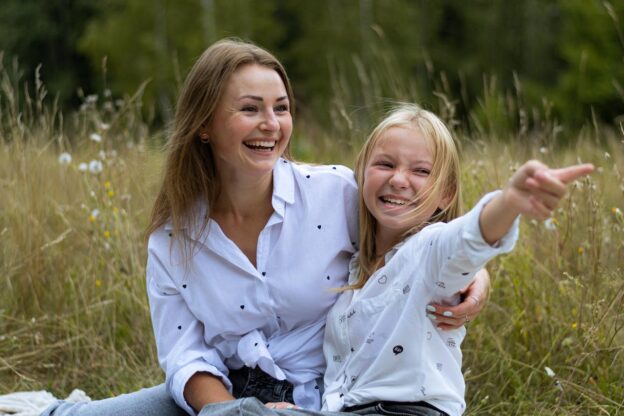 A mother and daughter in a field