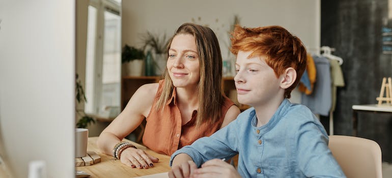 A mother spending time with her son, aware that there is a strong relationship between substance abuse and parenting styles