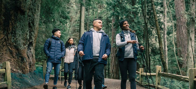 People walking in the forest, building support groups and unleashing the the ecotherapy potential in addiction treatment in West Virginia