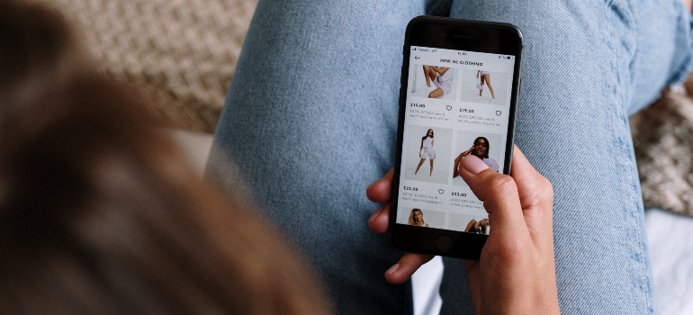 A woman shopping on her phone
