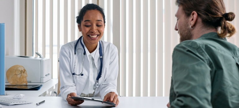 A doctor talking to a patient about methadone and chronic pain management