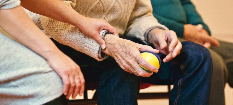 Person holding a stress ball