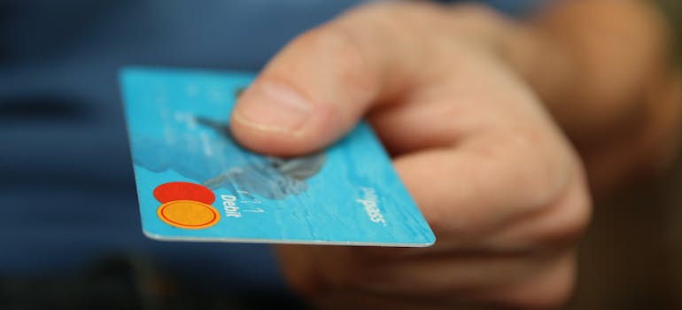 person holding a card