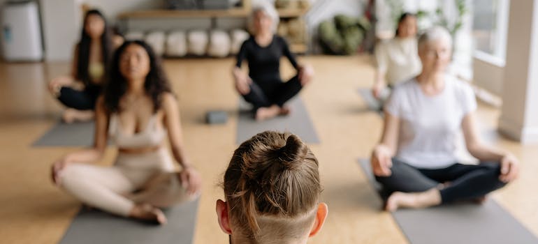 People during group meditation