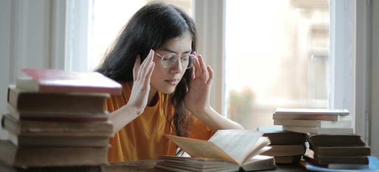 A woman having a headache.