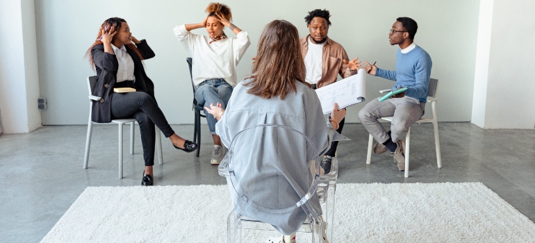 People talking to a therapist