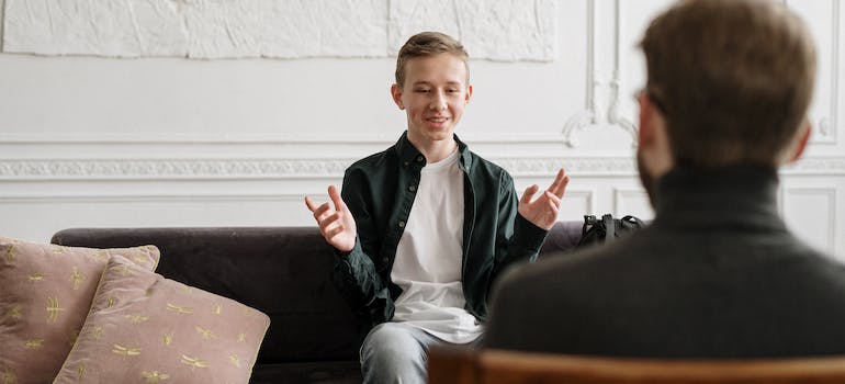 A young WV student talking to a therapist