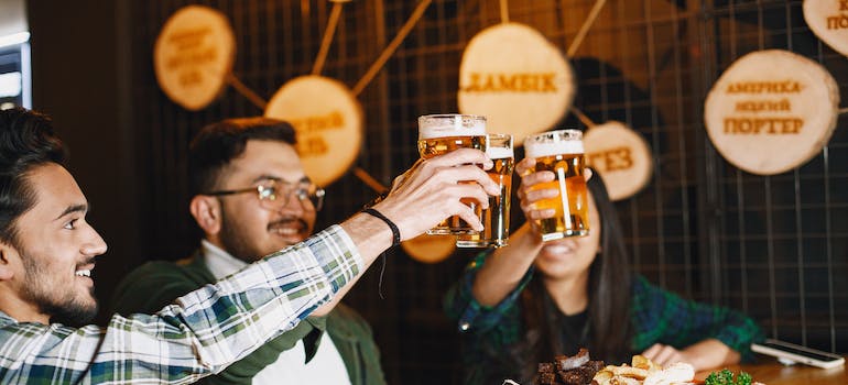A group of students drinking beer together
