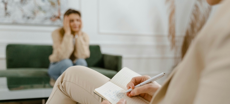 Therapist making notes.