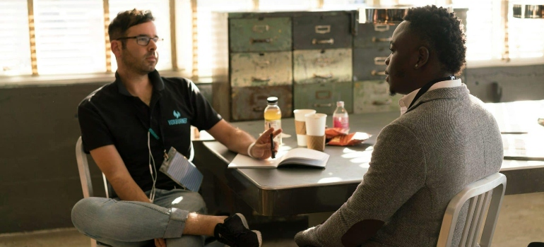 Man talking to a therapist about 12-Step Programs in WV.