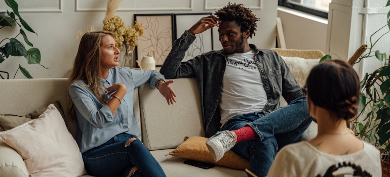 A man and a woman talking to a therapist about couples who do drugs together