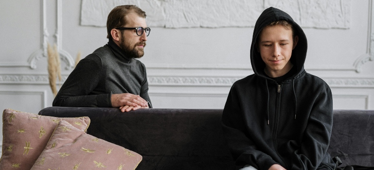 A young man talking to a therapist
