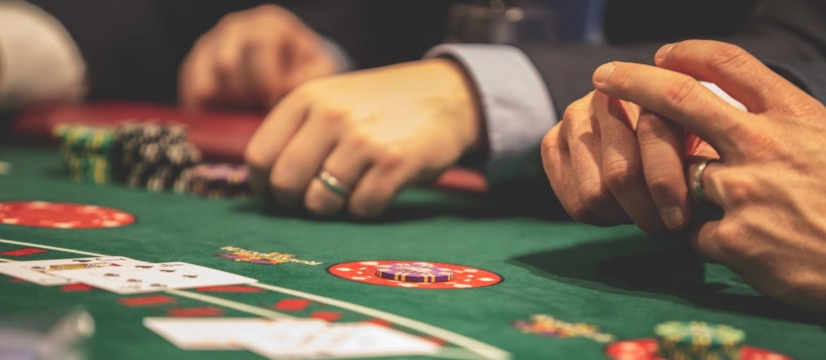 People playing poker in the casino.