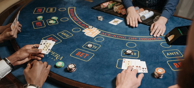 People playing poker in the casino.