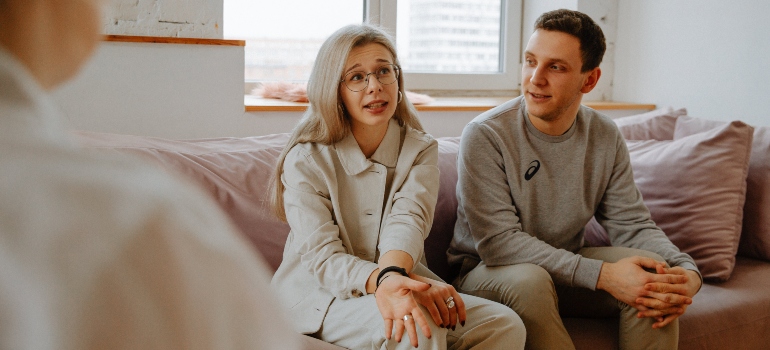 A man and a woman talking to a therapist about couples who do drugs together