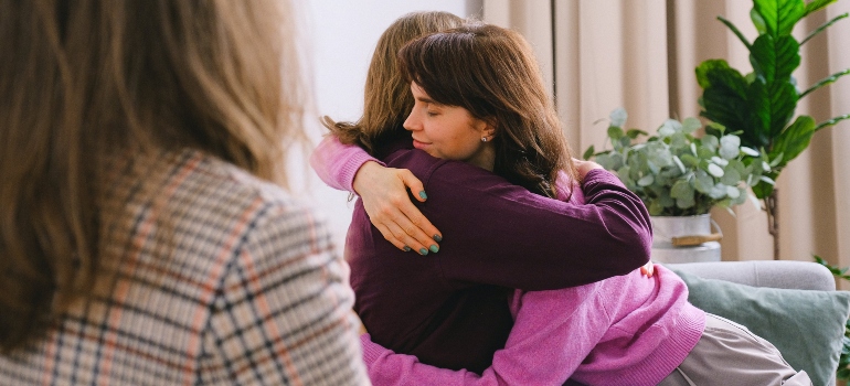 A man and a woman hugging
