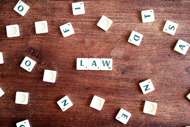 "law" written with tiles