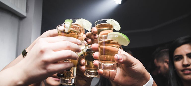 people doing cheers.