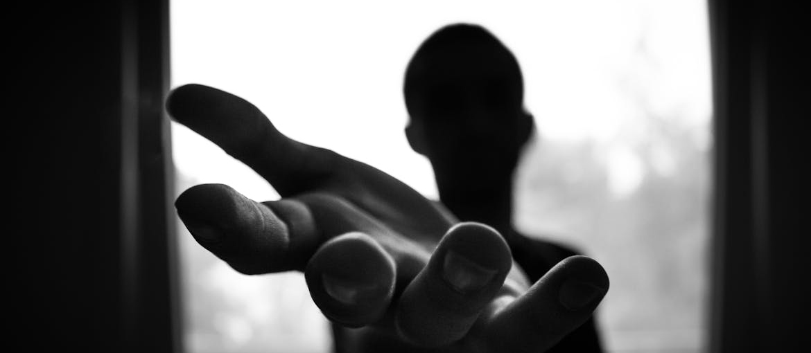 A man reaching out for help.