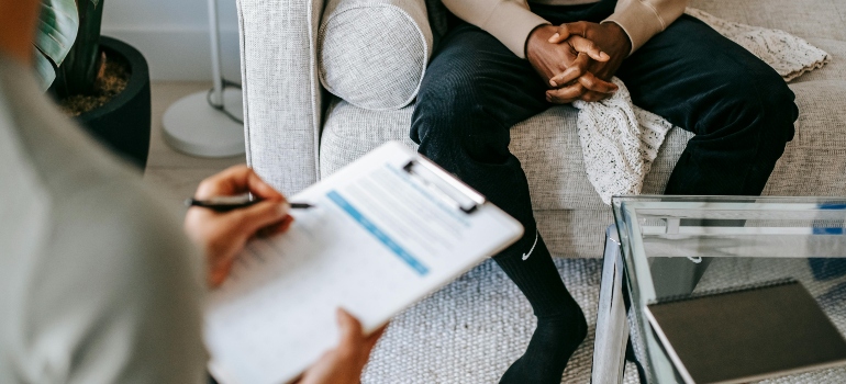 A man talking to a therapist about drugs associated with violent acts
