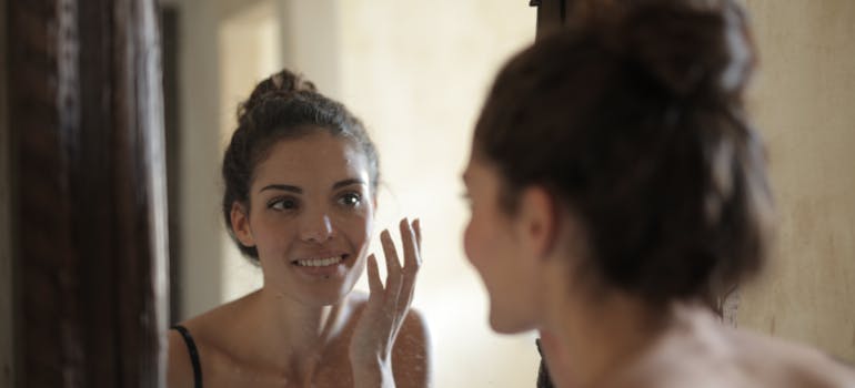 woman doing her skincare.