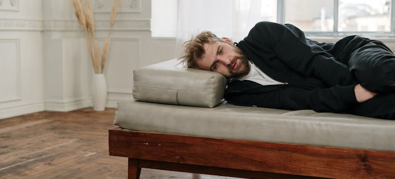 man laying on the couch.