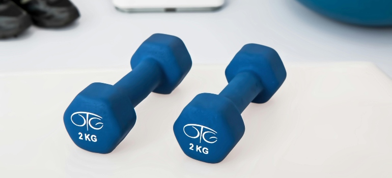 Two blue dumbbells