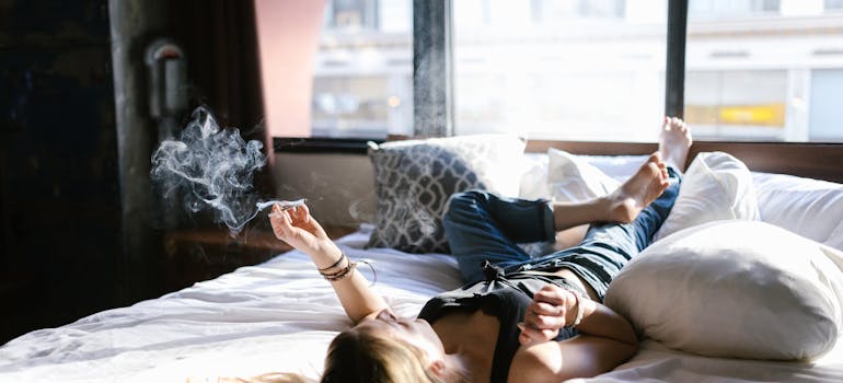 Woman smoking marijuana, one of the most commonly abused drugs among millennials. 