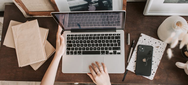 Woman researching on her laptop how to prepare for rehab.