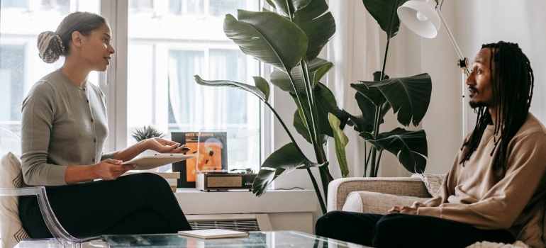 A man on an individual therapy session is maybe discussing substance use among introverts