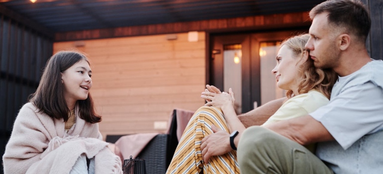 Parents talking to their child.