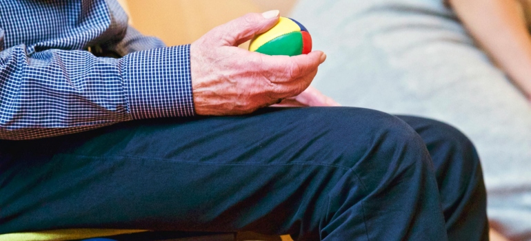 Person holding a ball