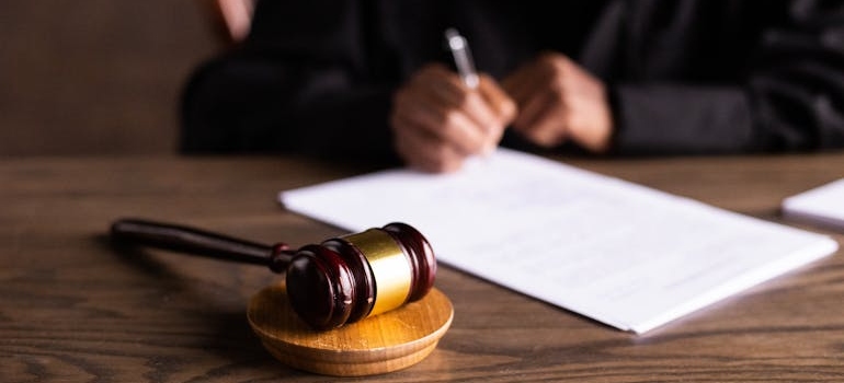 Judge signing a law on drugs addiction and domestic violence in West Virginia.