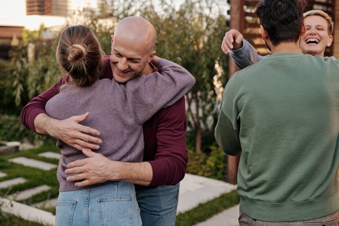 People hugging presents Balancing Self-Care While Supporting an Addicted Loved One
