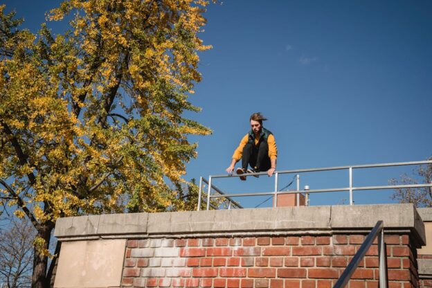 Common Drugs That Can Cause Suicidal Thoughts represented via a man who possibly considers jumping of the building