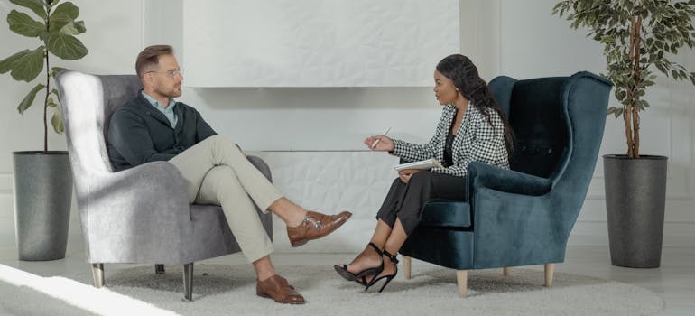 Man having a therapy session with his therapist.