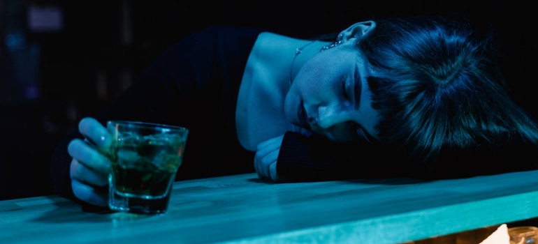 a woman experiencing alcoholism and mental illness
