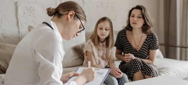 A mother and daughter in a therapy session