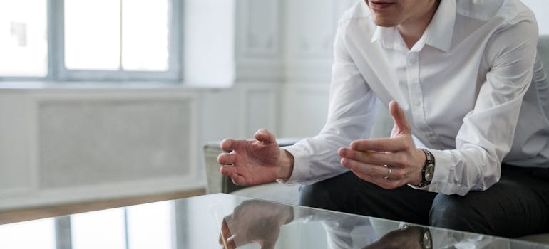 Man expressing his needs clearly while practicing assertiveness in recovery.