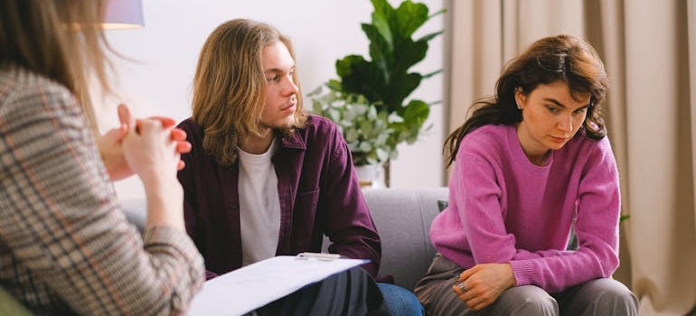 Couple receiving therapy to learn assertiveness in recovery.