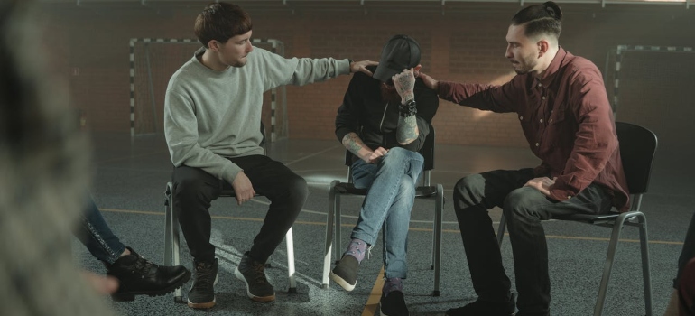 people in a support group meeting