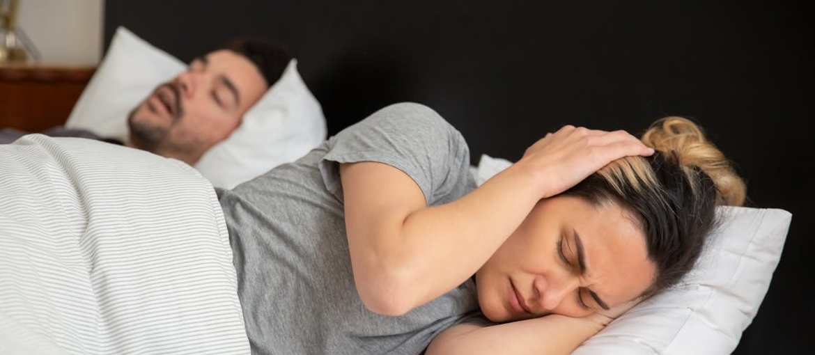 A couple with sleeping problems.