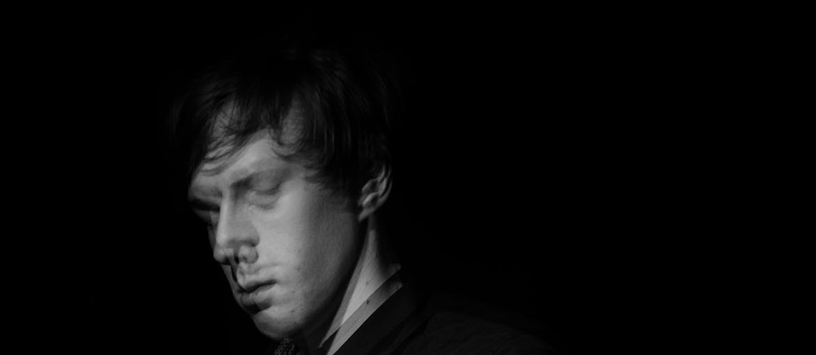 A man shaking his head.